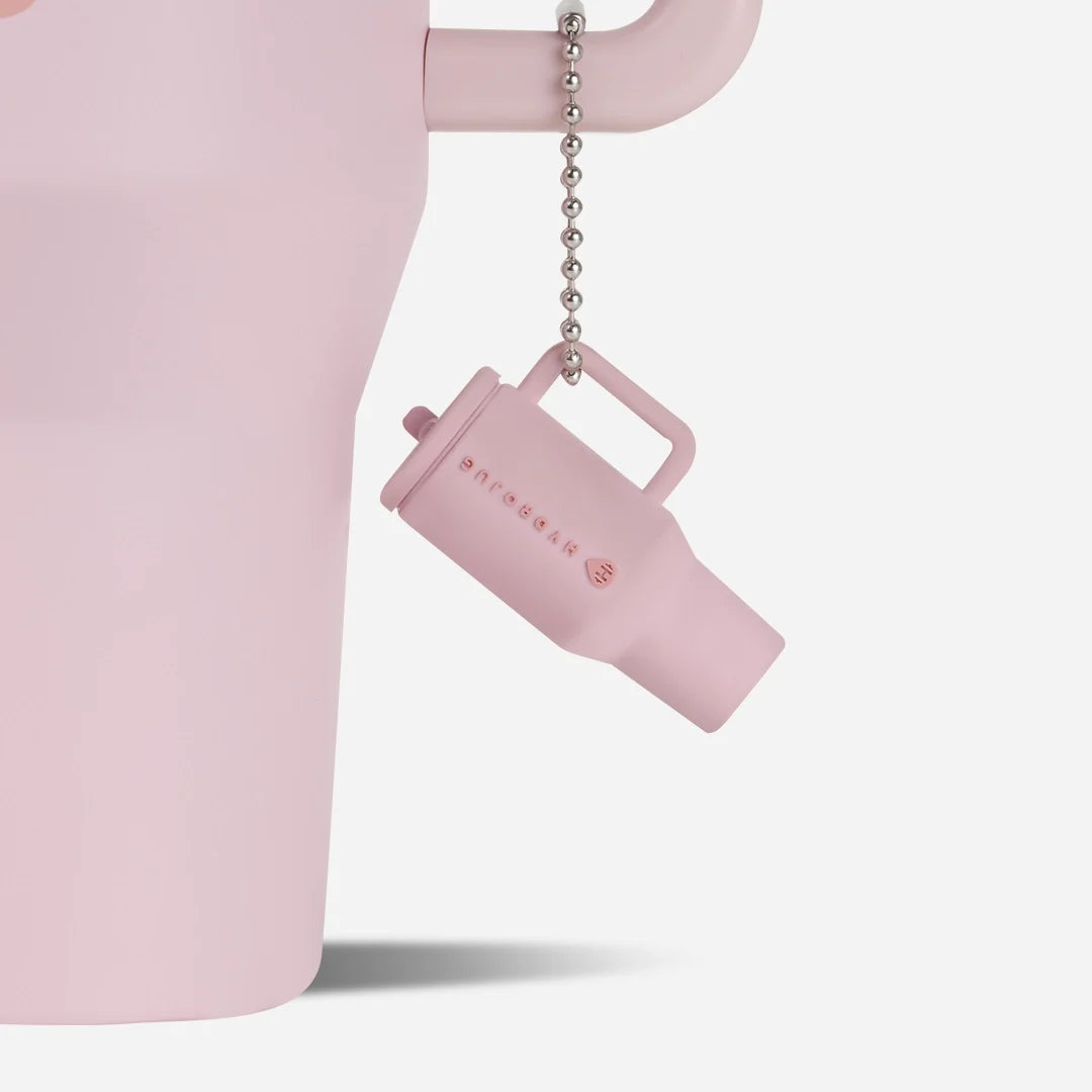 traveler-keychain-o0 Web-TravelerKeychainPhotos-PinkSand2.webp